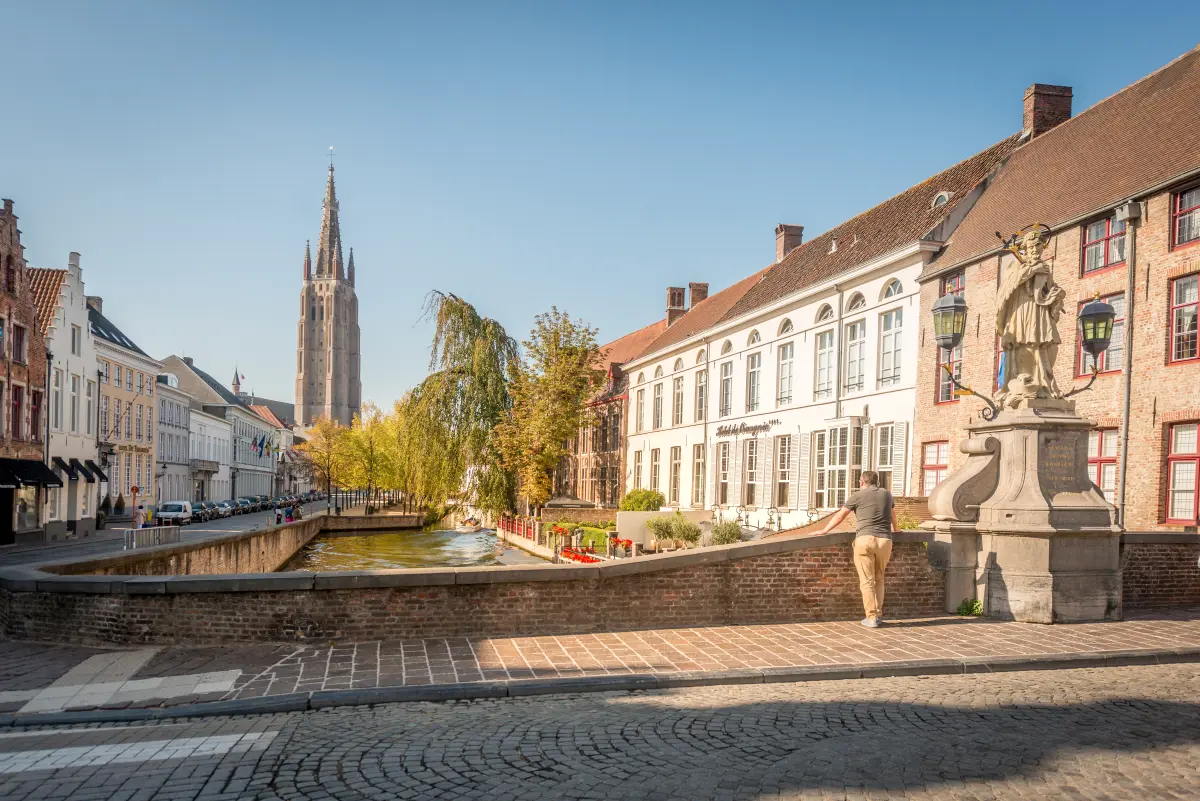Nepomucenus Bridge overlooking the Dijver and in the background the tower of the Church of Our Lady